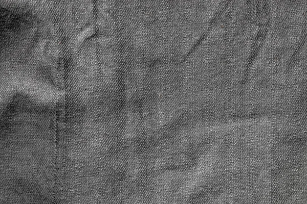 Crumpled dark gray fabric texture as background — Stock Photo, Image