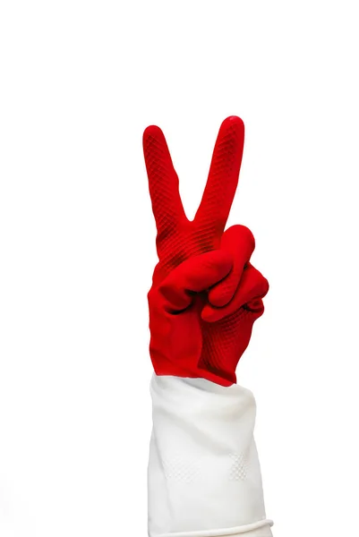Hand i röd Gummihandske med två fingrar är vikta, visar vad logga allt är cool. Isolera på en vit bakgrund. rengöring är utmärkta, kul rengöring, Påsk uppdatering, påskharen, medicin — Stockfoto