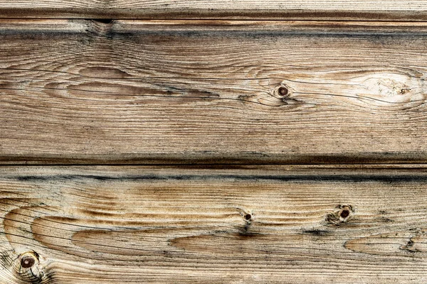 ノットテクスチャの背景を持つ古い木製の板 — ストック写真