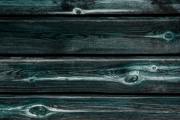 ノットテクスチャの背景を持つ古い暗い木製の素朴な板 — ストック写真