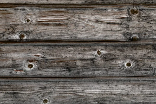 ノットテクスチャの背景を持つ古い木製の板 — ストック写真