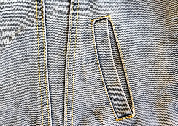 Seitentasche der Jeansjacke in Nahaufnahme, Kleidung, Jeans, Knopfloch, Stoffstruktur — Stockfoto