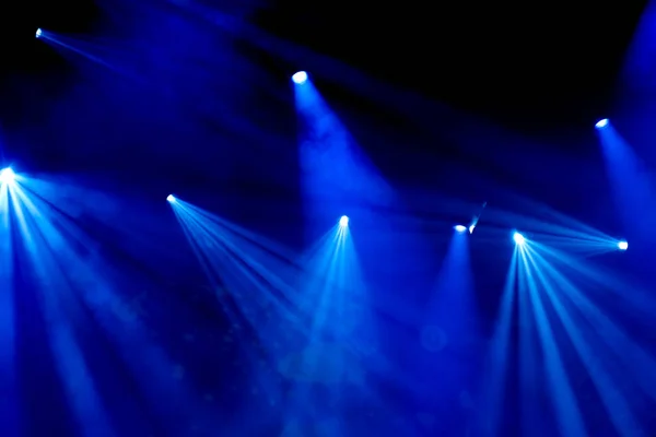 Blue stage light  with smoke in concert