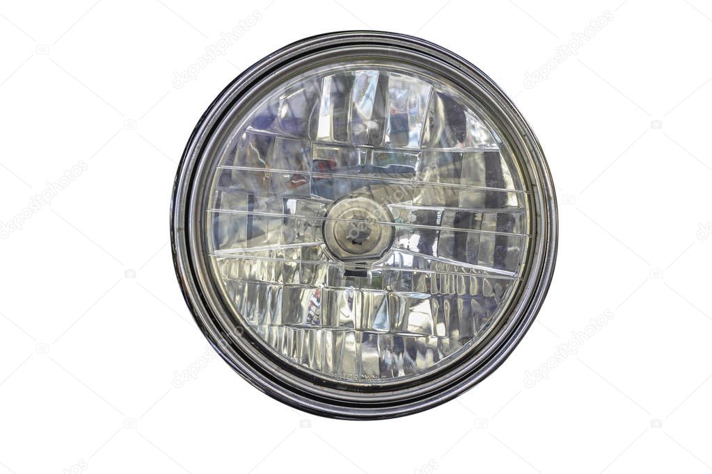 Closeup of car headlight isolated on white background, Clipping path included.
