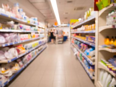 Süpermarket mağaza bokeh ile arka plan bulanık. Defokus görüntüsü