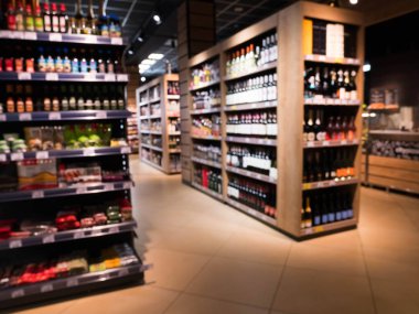 Süpermarket mağaza bokeh ile arka plan bulanık. Düşük ışıklı defokus görüntüsü