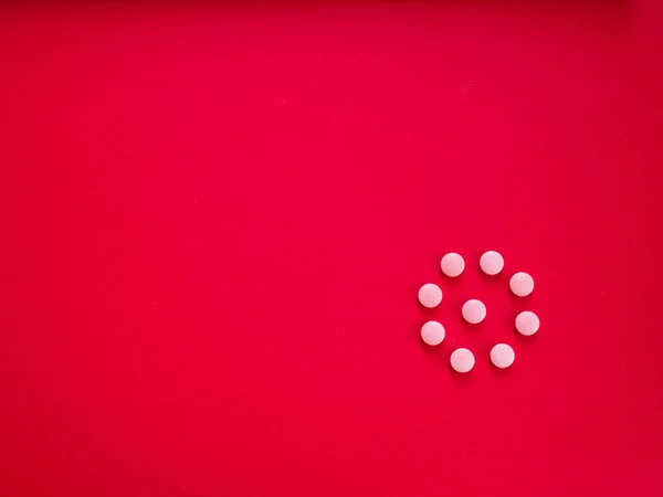Pills on red copy space top view — Stock Photo, Image