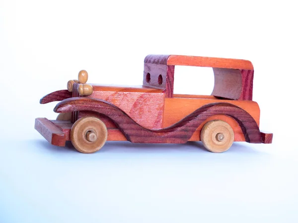 Natural wooden toy retro car, a white background — Stock Photo, Image