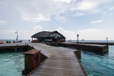A landscape of one Maldives island - which is considered to be the most lavish, popular vacay destination in Asia because of its varity of foods, laxurious water and beach villa, and tranquil staycation