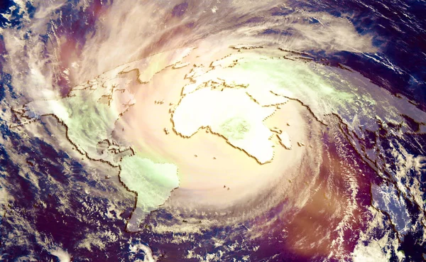 壊滅的な気候の概念は 世界地図の背景に巨大なグローバル ハリケーンを変更します Nasa から提供された要素を使ってコラージュ — ストック写真
