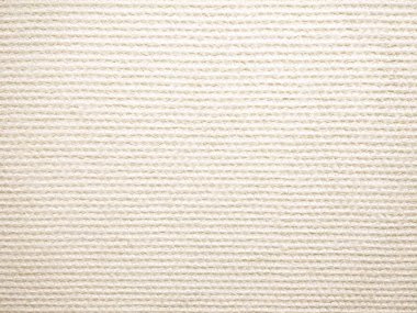 bej renkli ev açık, küçük dışbükey kareler, arka plan deseni ile yapılandırılmış.