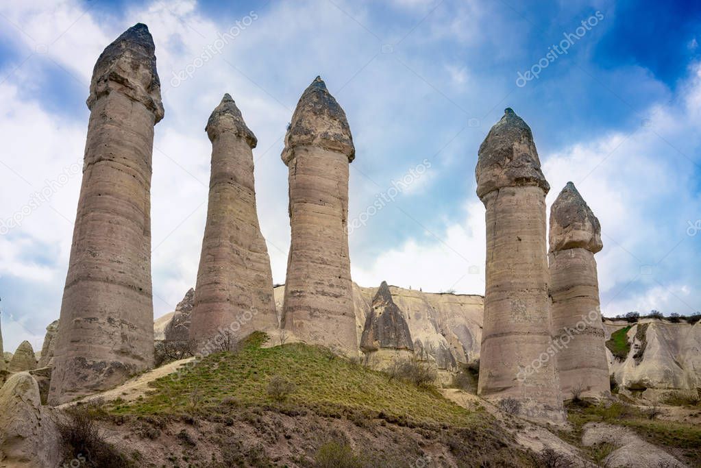 Love valley with huge phallus shape stones in Goreme village, Turkey. Rural Cappadocia landscape. Volcanic mountains in Goreme national park. Countryside lifestyle.