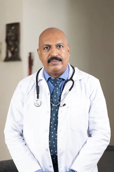 An Indian doctor at his own clinic