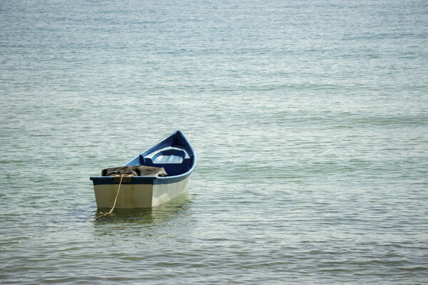 Small boats park by the sea. Small boats near the beach. Sandy b