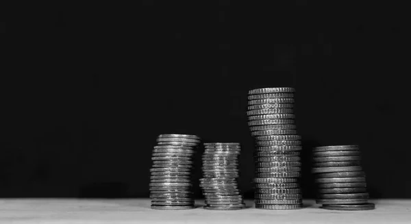 Close-up of a pile of silver coins on a black background — Stock Photo, Image