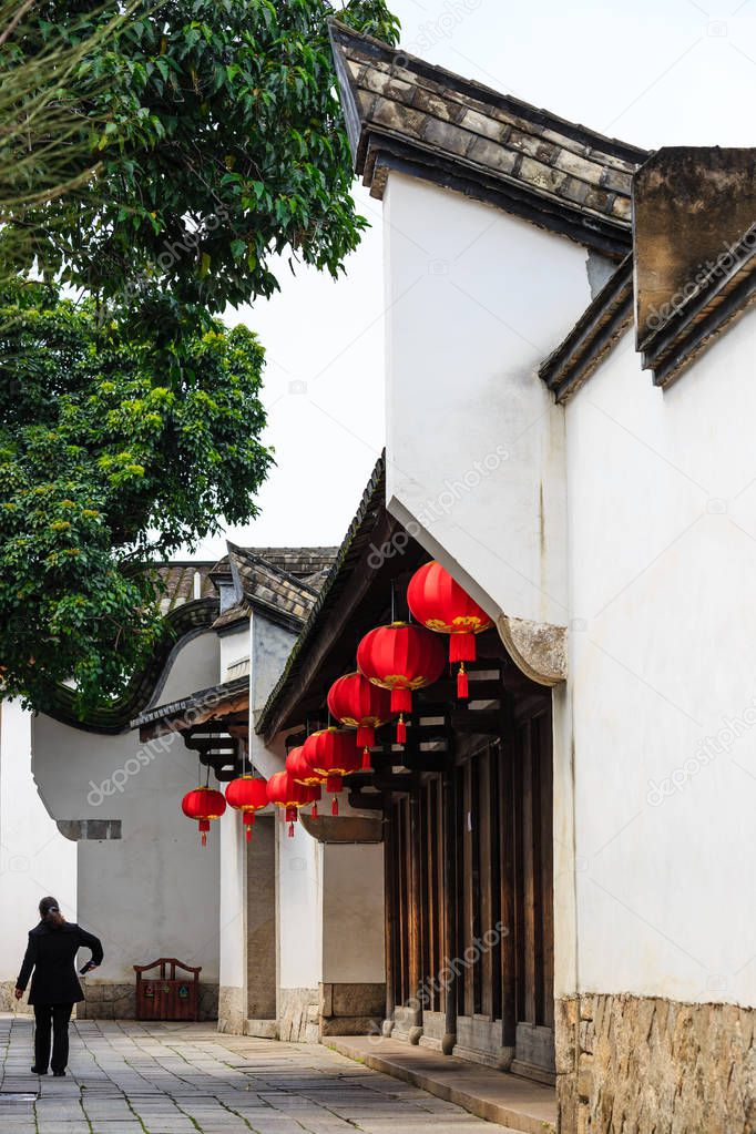 Architecture details of white color Chinese historic building facade