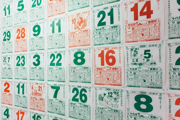 Vintage Chinese calendar paper on the wall background