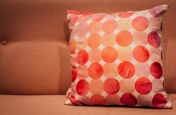 red dot color Pillow on sofa in room