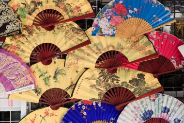 Singapore-09 JUN 2018:Chinese traditional style fans display on wall and sale