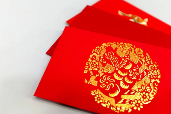 Chinese dog new year red package display on white background