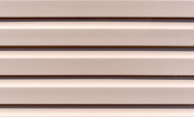 Binanın bej kaplama duvarlarının dikişsiz dokusu