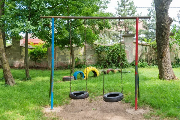Children Playground Made Old Tires Two Children Swings Made Car — Stock Photo, Image