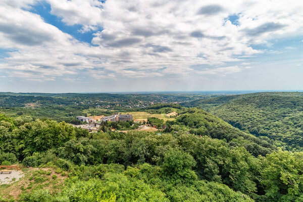 Vrdnik, Serbia-July 15, 2020: Resort Hotel Fruske terme in Ethnic Village Vrdnicka kula. View of Fruska gora, the largest mountain in Vojvodina.