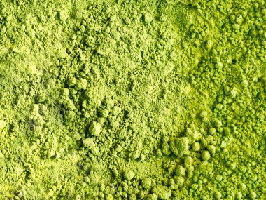 Uyuşan çay dokusu arka planı. Sağlıklı içecek, detoks, yeşil, yakın plan.