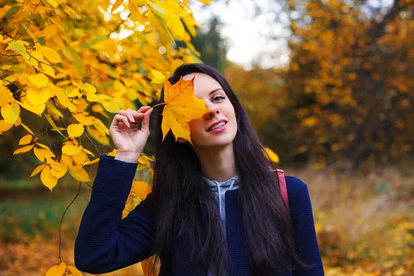 Beautiful Smiling Brunette Covering One Eye Yellow Maple Leaf Enjoy — Stock Photo, Image