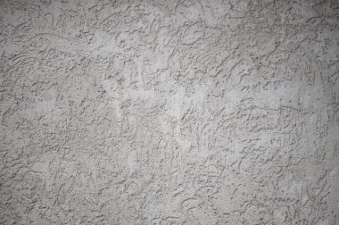 Damarları ile bir arka plan olarak dokulu dokulu gri pürüzlü duvar 