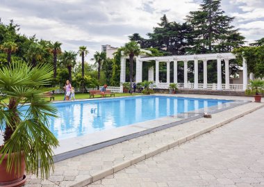 Turist, seyahat etmek, ziyaretçi botanik bahçesi içinde dinleneceği yere,