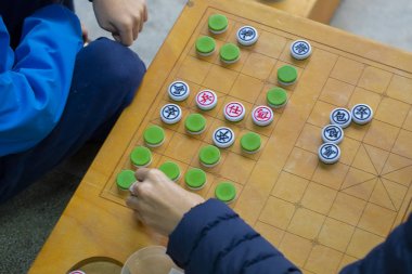 Toplum Aktivite Merkezi Limin Rekreasyon ve Satranç Yarışması (Satranç kelime: kral, beyefendi, faz, araba, at ev sahipliği yapıyor ... Çin satrancı)