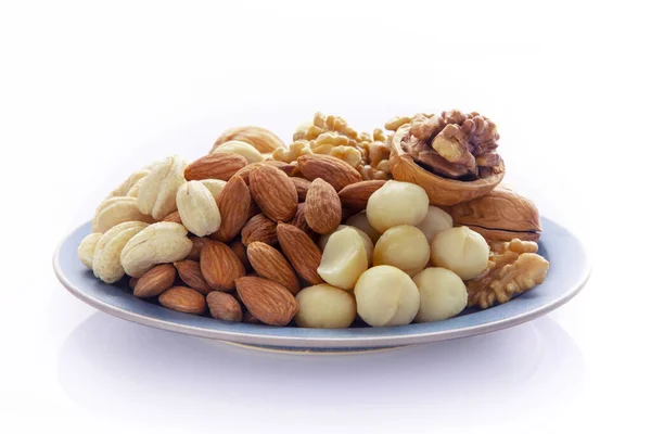 Nährstoffreiche Nüsse Auf Dem Teller Walnüsse Mandeln Cashewnüsse Macadamianüsse — Stockfoto