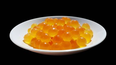 Dev deniz yayın balığı yumurtası, arius thalassinus, tabakta balık yumurtası ve kesme maskeleri.