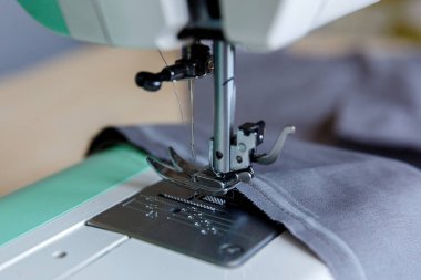 Çalışma süreci. Dikiş makinesi ayak ve iğne