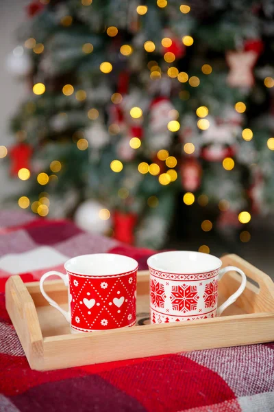 Christmas Background Red White Mugs Wooden Tray New Year Tree — Stock Photo, Image