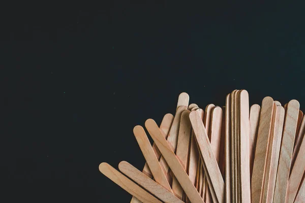 Wood sticks isolated on black background