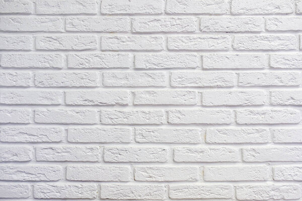 Pattern of white bricks wall.