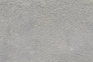 Gri beton bir duvar parçası..