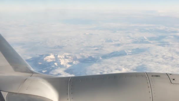 Airplane wing above the clouds - Closeup — Stock Video