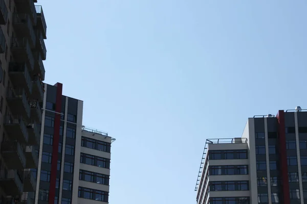 Rooftops of residential buildings. Balconies and terraces at the multistorey houses.