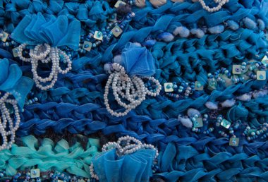 Karmaşık işlemeli arka plan. Yama işi. El yapımı arkaplan. 