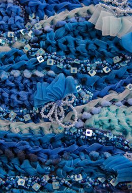 Karmaşık işlemeli arka plan. Yama işi. El yapımı arkaplan. 