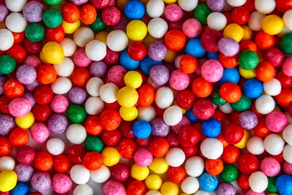 Kleurrijke heldere achtergrond, multi-gekleurde ballen. Zoete mooie achtergrond Candy. — Stockfoto