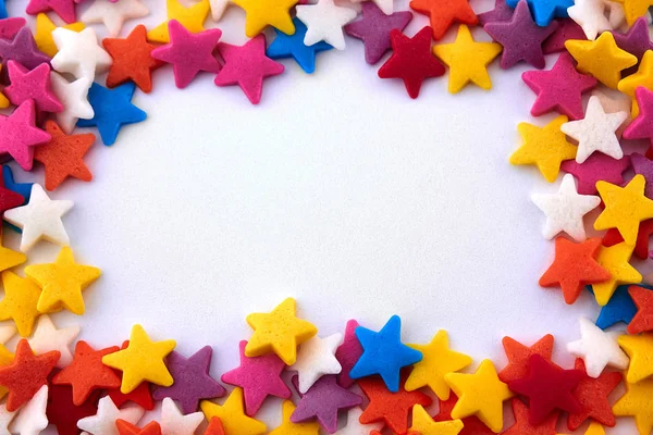 Colorful bright background, multi-colored stars. Sweet nice background candy. — Stock Photo, Image
