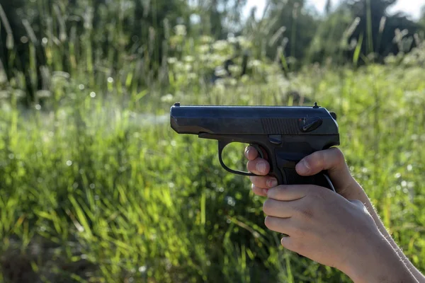 Shot Exit Gases Pistol Child Holds Weapon Two Hands — Stock Photo, Image