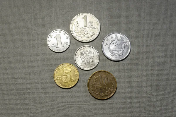 Friendship coins in the world economy, the Chinese yuan and the Russian ruble.