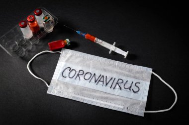 Üzerinde kan olan bir şırınga ve yeni bir NCOV için yapılan kan testi neticesinde oluşan ampul - 2020 Coronavirus, Çin 'in Wuhan şehrinden kaynaklanıyor.