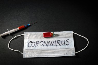 Üzerinde kan olan bir şırınga ve yeni bir NCOV için yapılan kan testi neticesinde oluşan ampul - 2020 Coronavirus, Çin 'in Wuhan şehrinden kaynaklanıyor.