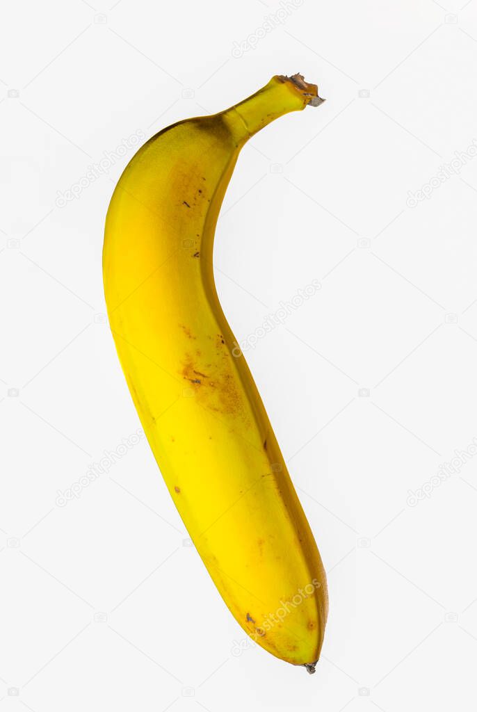 ripe single yellow banana isolated on white background